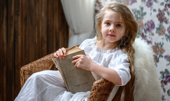 Young girl holding a book