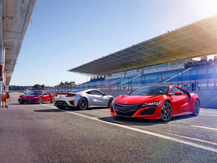 Honda NSX cars on a race track