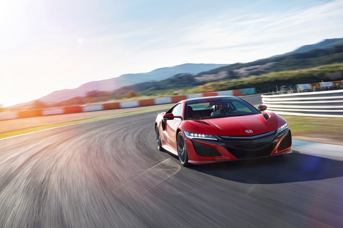 Red 2016 Honda NSX on a race track