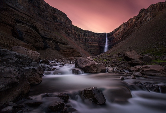 Hengifoss Waterfall in Iceland at sunset