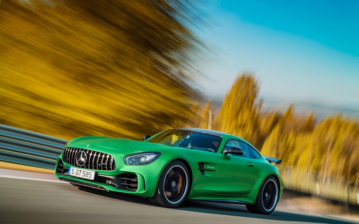 Green Mercedes-AMG GT R driving on a track