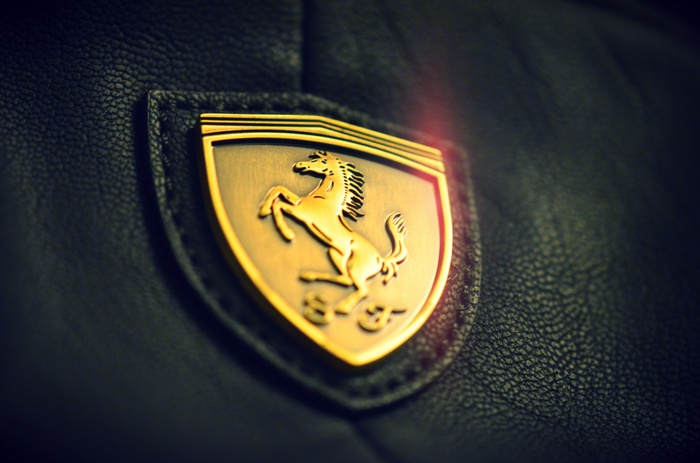 Ferrari Prancing Horse Logo on Black Leather 4K