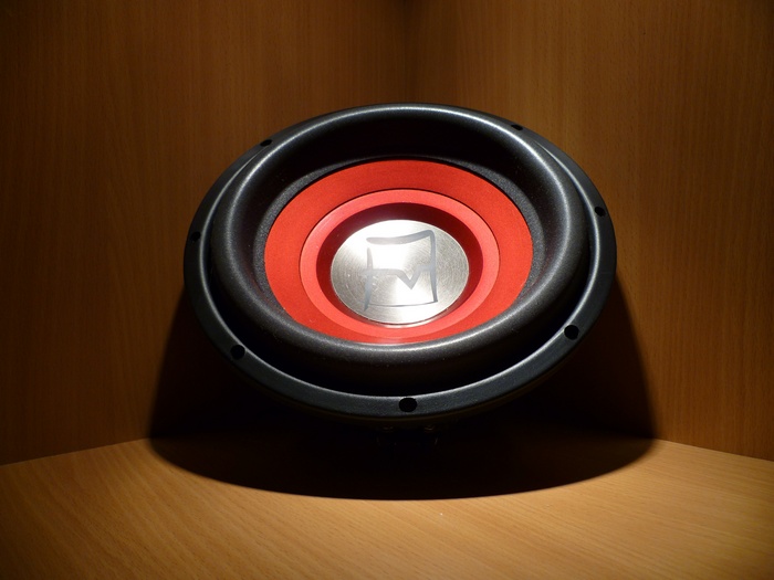 Subwoofer with red cone and silver logo