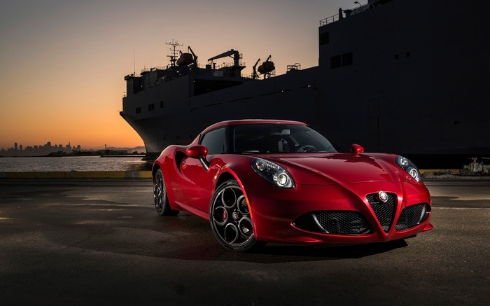 Red Alfa Romeo 4C Coupe by a Ship