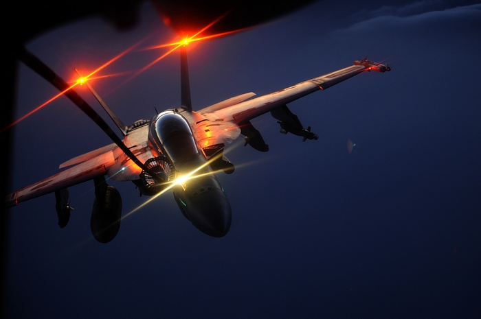 Boeing F/A-18E Super Hornet refueling at night