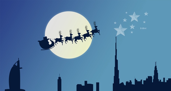 Santa Claus flying over Dubai skyline with moon