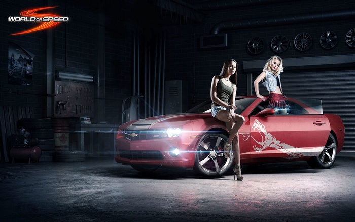 World of Speed: Two women and a red Chevrolet Camaro in a garage