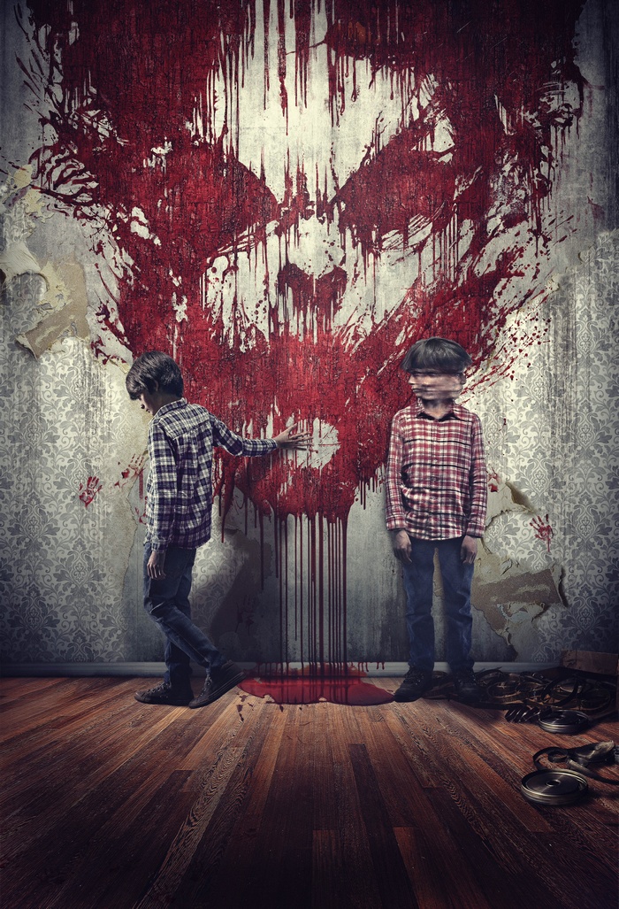 Sinister 2: Two boys in front of a bloody wall painting