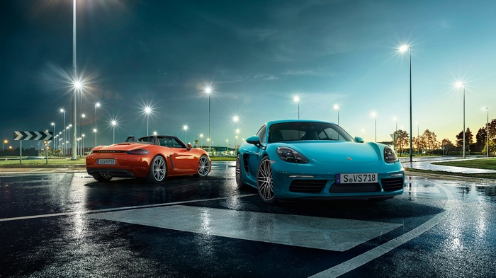 Porsche 718 Cayman S and 718 Boxster on wet road