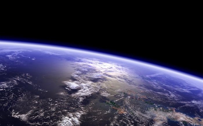 Earth from space with atmosphere and clouds
