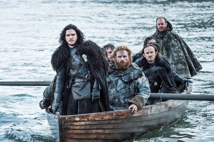 Jon Snow and men in a boat from Game of Thrones