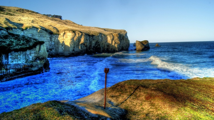 Coastal cliffs and ocean waves