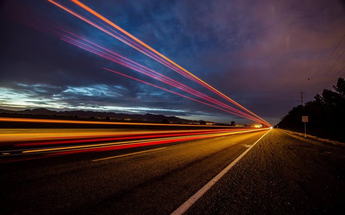 Light trails on a highway at dusk