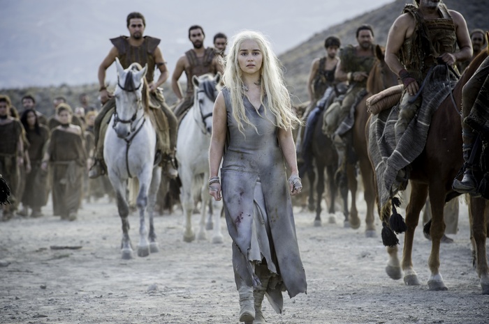 Daenerys Targaryen and her followers in a desert