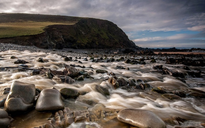 River flowing over rocks towards the sea