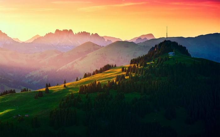 Mountain range at sunset with radio tower
