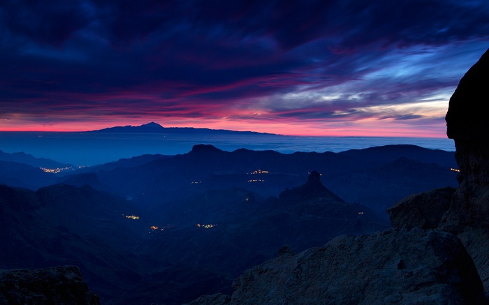 Mountain landscape at dusk with colorful sky