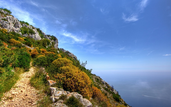 Mountain path overlooking the sea