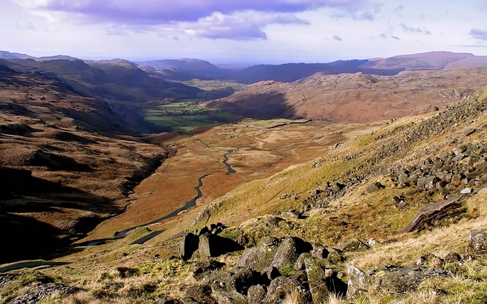 Valley with a winding river and mountains