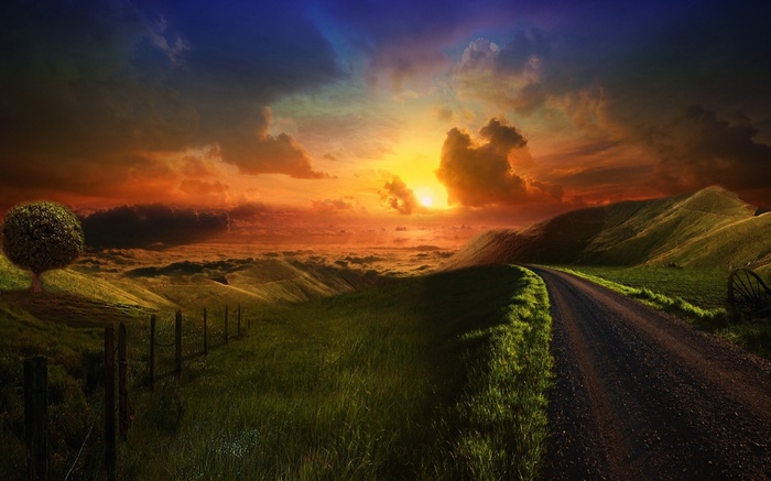 Rural landscape with a road at sunset