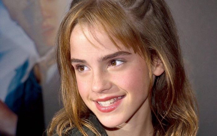 Emma Watson with Warm Smile and Brown Hair