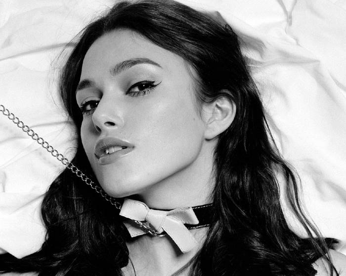 Woman with collar and chain