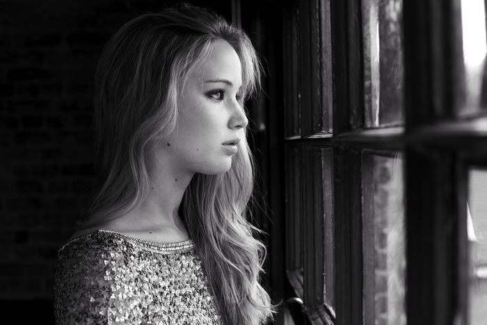 Jennifer Lawrence looking out a window