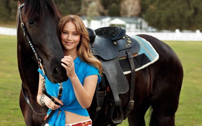 Jennifer Lawrence with a horse