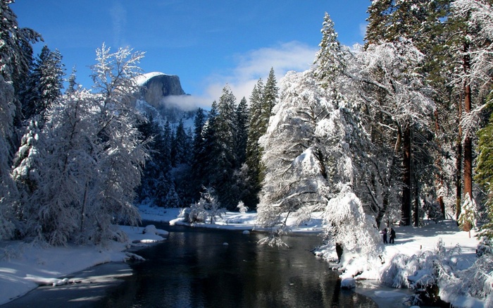 Snowy Yosemite Valley with Half Dome and Merced River