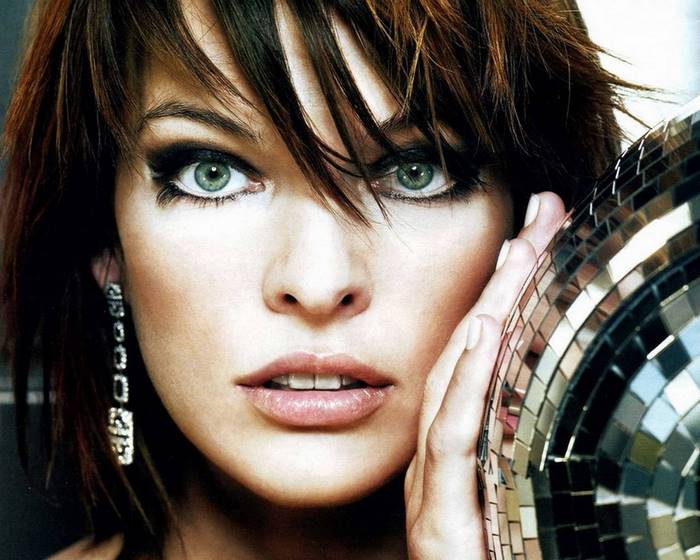Milla Jovovich with a disco ball