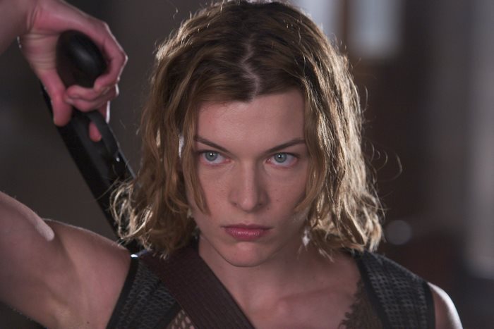 Milla Jovovich holding a weapon