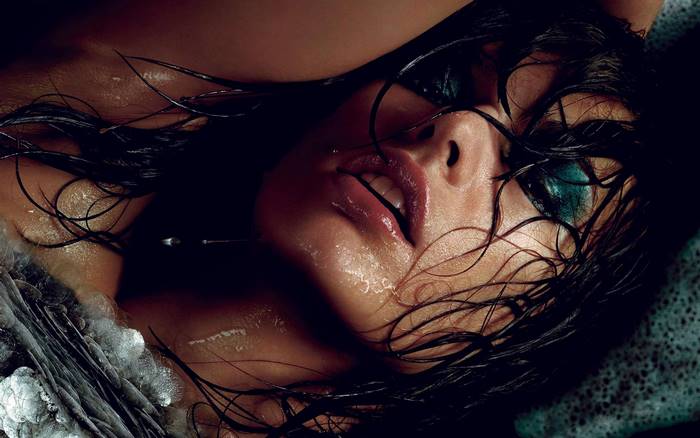 Close-Up of Wet Milla Jovovich with Dark Makeup