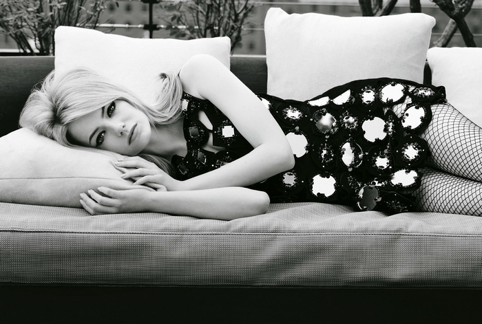 Emma Stone on a couch