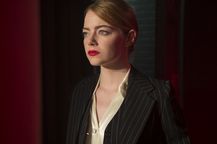 Emma Stone in a pinstripe suit