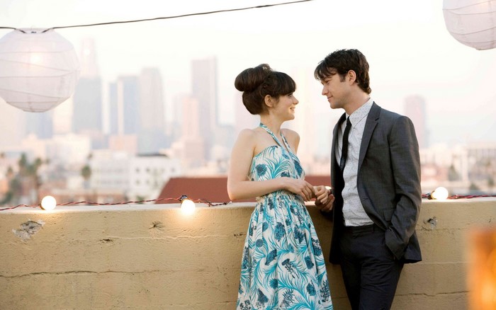 Zooey Deschanel and Joseph Gordon-Levitt on a rooftop