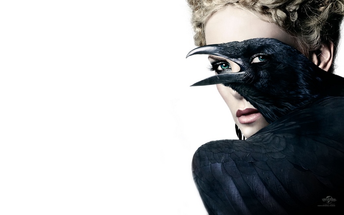Charlize Theron with a raven