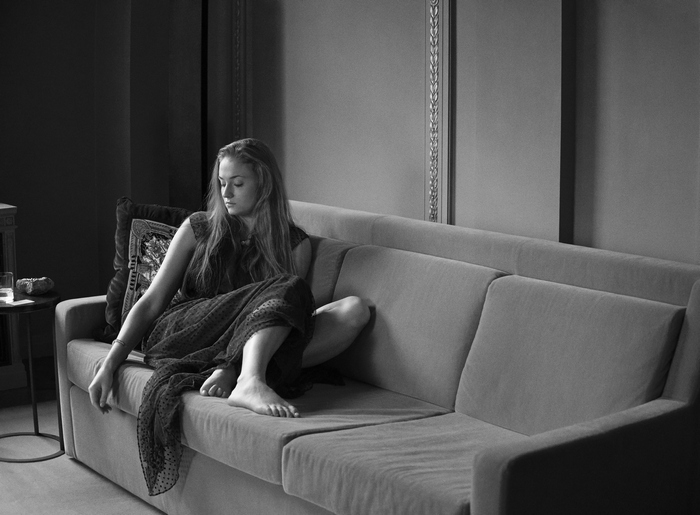 Sophie Turner on a couch