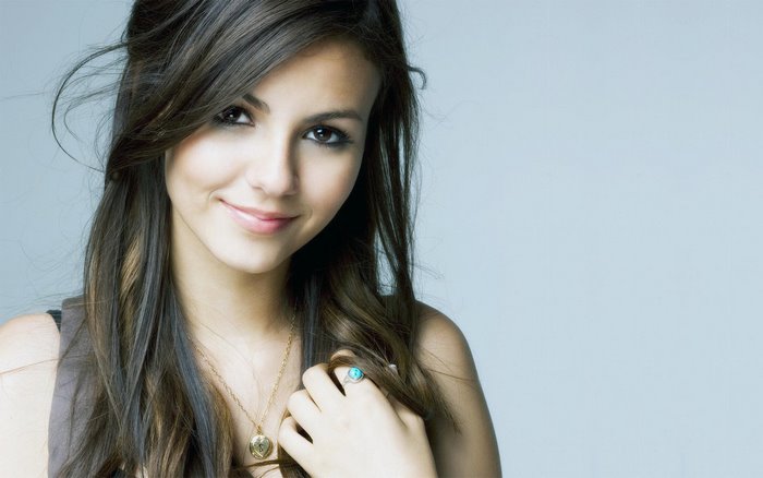 Smiling Victoria Justice with Long Dark Hair