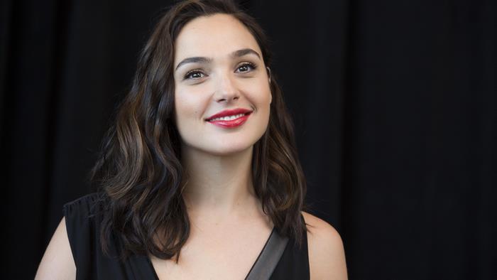 Gal Gadot Smiling with Dark Wavy Hair