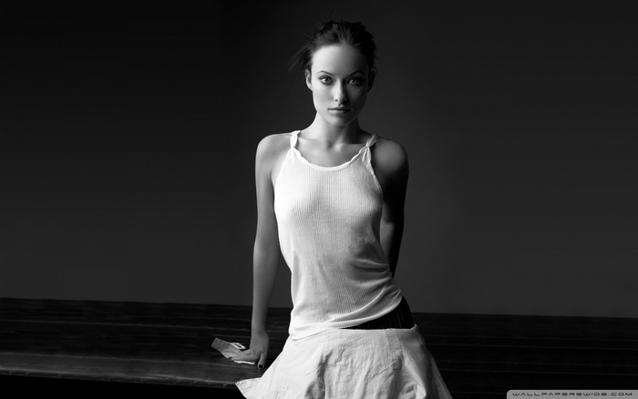 Olivia Wilde in white tank top and skirt