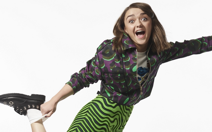 Maisie Williams in patterned jacket and skirt