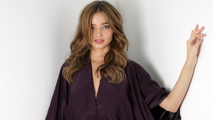 Miranda Kerr in a purple dress