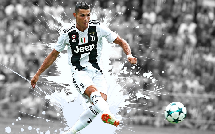 Cristiano Ronaldo Kicking Soccer Ball in Action
