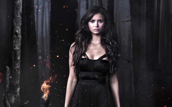 Nina Dobrev in a dark forest