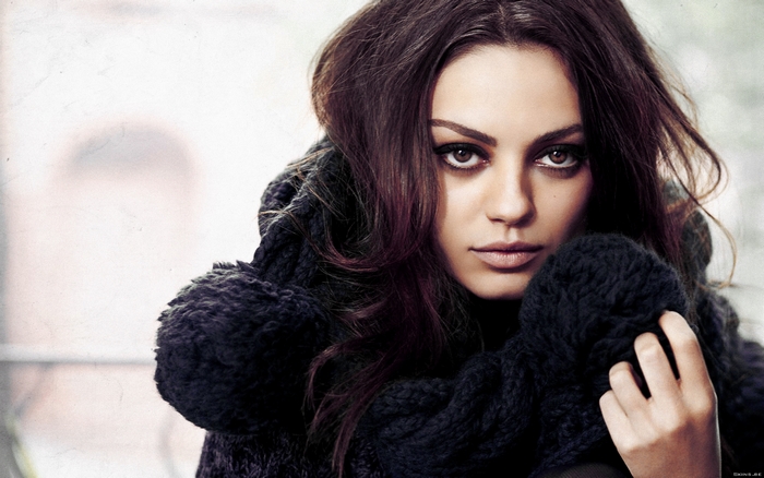 Mila Kunis in a dark scarf