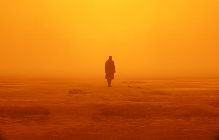 Ryan Gosling in a desolate orange landscape