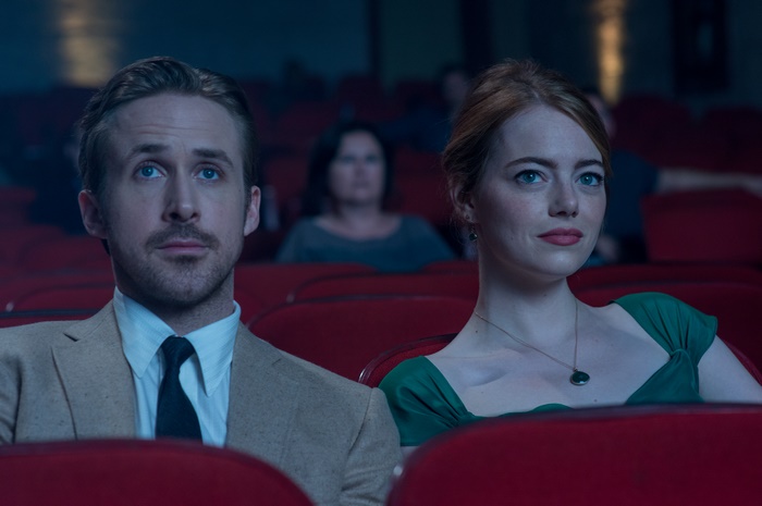 Ryan Gosling and Emma Stone in a movie theater