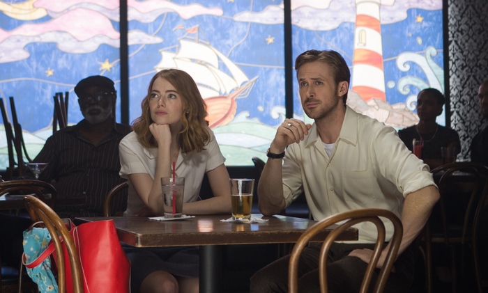 Ryan Gosling and Emma Stone at a table