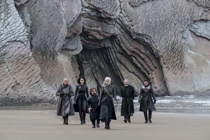 Peter Dinklage and cast from Game of Thrones on a beach