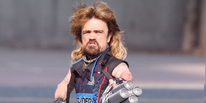 Peter Dinklage as a character with a gun